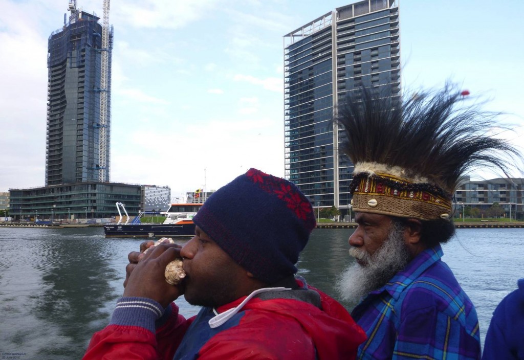 On The Blackbird, Piter Elaby blowing tabura (the traditional Melanesian call to ceremony) with Mesak Karubaba